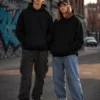 Sudadera Unisex con capucha. Playerytess. 9000U-Negro